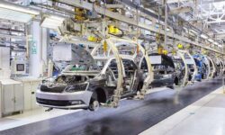 Role Distribution Between the Kanban System and Production Scheduler